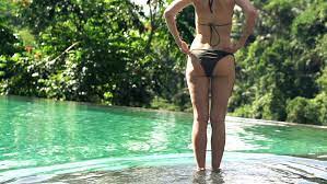 View production, box office, & company info. Sexy Woman In Bikini Standing Stock Footage Video 100 Royalty Free 15098641 Shutterstock