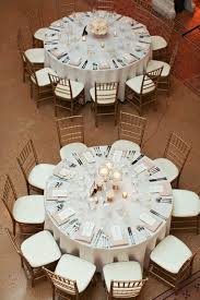 I Like The Difference In Centerpieces Between These Two Tables Via Style Me Pretty Illinois Table Decorations Round Table Settings Wedding Table Settings