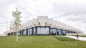 The adidas group today officially laid the foundation stone for two new employee buildings at its headquarters in herzogenaurach. Rhomboid Roof Brings Light Into Cobe S Halftime Building On The Adidas Campus