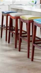 Stationary wooden bar stool with comfortable leather cushion. Julien Bar Counter Stool Grandin Road Comfortable Bar Stools Home Decor Kitchen Home Decor