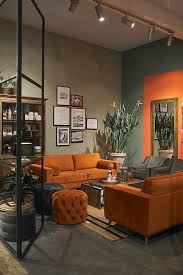 Orange Interior Dare To Make A Statement With The Colour Orange A Gorgeous Pumpkin Coloured Sofa Adds Living Room Orange Orange Home Decor Home Living Room
