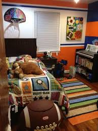 15 Sports Inspired Bedroom Ideas For Boys Sports Themed Bedroom Sport Bedroom Kids Sports Bedroom