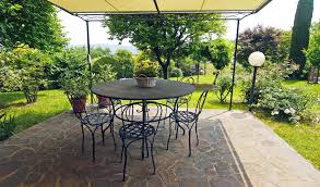 Get garden patio ideas here with our gallery of 29 patios surrounded by lush gardens of tall grasses, plants and trees. 10 Tips For Planning A Patio Garden Patio Design Ideas
