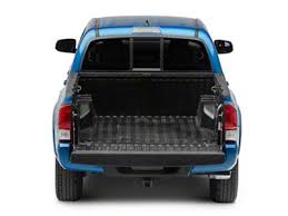 Carpet floor mat and door sill protector package. Tacoma Bed Mat 05 21 Tacoma