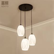 Whether you're looking for a low hanging chandelier, an intricately designed pendant lamp or a ceiling track of spotlights, you'll find plenty to choose from in our range. Buy Led Modern Minimalist Restaurant Three Light Chandelier Nordic Ikea Creative Personality Pendant Round Dining Table Dining Room Lights In Cheap Price On Alibaba Com