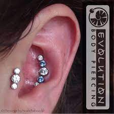 fresh tragus and conch piercings with titanium jewelry by anatometal at evolution piercin body jewelry piercing ear piercings conch unique body piercings