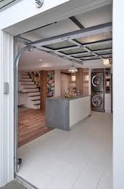 Check out these garage storage ideas and find out how how big your garage will need to be to fit everything in. Ballard Basement Garage Door Entrance Modern Basement Seattle By Jackson Design Build