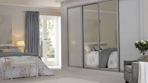 To fit the top and bottom tracks and insert the sliding doors, you will need to measure the. Sliding Wardrobes Mirrored Arch Fitted Wardrobes From Betta Living