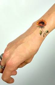 Roses make one think of love and romance while sunflowers bring to mind a bright and sunny stress free day where everything is right in the world. 23 Beautiful Sunflower Tattoos For Women The Trend Spotter