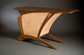 My passion is wholeheartedly the attention to detail that it takes to truly to design and build a custom piece that will be a piece everyone talks about and asks about. Seth Rolland Custom Furniture Design
