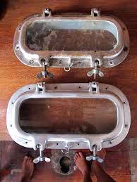 Restoring The Port Lights Sailboat Restoration Aluminum Polish Verywellsalted Com Boat Restoration Boat Projects Sailboat Restoration