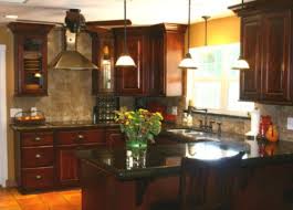 uba tuba granite with dark cabinets