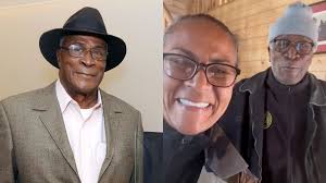 Filha de John Amos detalha forma chocante como descobriu morte do pai, e  racha familiar vem à tona: "Lutando para entender como aconteceu"