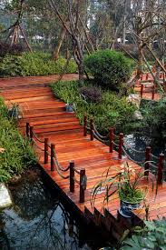 If bridges have been on your mind as an addition to your own personal landscape features, then hopefully this has been a. 24 Incredible And Varied Garden Bridge Designs Garden Lovers Club