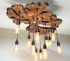 Large Live Edge Olive Wood Slab Chandelier Light Fixture Etsy Wood Light Fixture Rustic Chandelier Rustic Kitchen Lighting