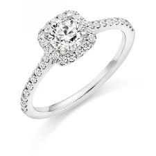 The halo engagement ring is the reigning queen of the bridal world. Halo Diamond Engagement Ring In Platinum