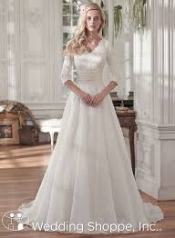 A Modest Lace Wedding Dress With 3 4 Length Sleeves Affiliate Modest Lace Wedding Dresses Wedding Dresses A Line Wedding Dress