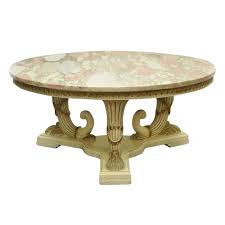 This piece is painted wood with polychrome floral decor; 1960s French Empire Neoclassical Cornucopia Base Round Pink Marble Top Coffee Table Chairish