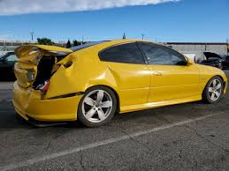 Image result for Yellow 2004 Pontiac