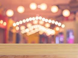 wooden board empty table blur in coffee shop blurred background wooden board brown wood
