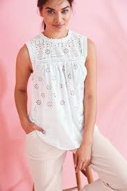 Our sleeveless tops are made from natural fabrics to suit the seasons. Buy White Broderie Sleeveless Top From The Fitforhealth Online Shop