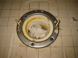 However, the process should be easier if begin by setting the toilet flange into position over the tile. Broken Plastic Toilet Flange Metal Repair Ring Installation Guide 015