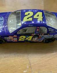 This is a target exclusive hot wheels petty racing 50th anniversary boxed set. Hot Wheels 1999 Monte Carlo Jeff Gordon Superman 24 Nascar 1 24 Diecast More Fun Comics And Games