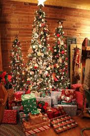 The slim christmas tree featured here is loaded with all kinds of christmas ornaments, like cranberries, snowmen, poinsettias, star ornaments and burlap, nothing we don't love. 25 Fabulous Christmas Trees The Contractor Chronicles Slim Christmas Tree Christmas House Lights Pencil Christmas Tree