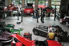 Zur Bildergalerie Car Workshop Motorcycle Garage Cool Garages