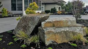 Select from patio town's many varieties of natural stone and rock such as flagstone or boulders, or let the experts at patio town assist you in selecting the right stone or decorative rock to enhance your yard or garden. Landscape Boulder Placement Portland Oregon