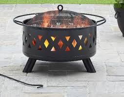 The fire pit's ingenious design includes a fitted copper lid so the pit can be converted to a side table when not in use. Fabulous Small Patio Fire Pit On A Budget