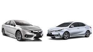 It will be of great help in case your vehicle starts straying on the road. Toyota Corolla Altis Grande Cvt I 1 8 Vs Honda Civic Vti Oriel 1 8 I Vtec Facelift Which Is Better Pakwheels Blog