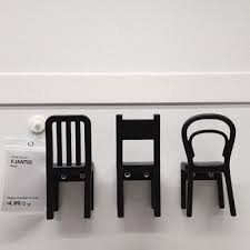 Three Ikea Chair Shaped Hooks Hanging On A Wall With A Price Tag Next To Them Ikea Chair Ikea Chair
