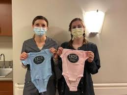 Fremont School District donates '1825 Days' onesies to MMH