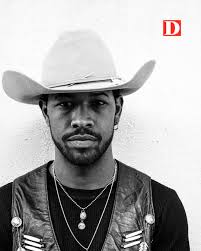 Angel White's debut album title, “Ghost of the West, is a nod to the Black  cowboy, the Native cowboy, and the Spanish cowboy—the vaqueros too often  forgotten. The boots he sometimes wears