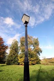 Well, this lamp post boasts automatic dusk to dawn lighting. Outdoor Pole Lights Outdoor Lamp Post Lights