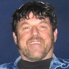 Obituary information for Raymond "Moon" Mullins