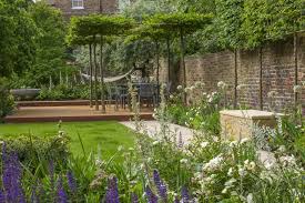 .the surroundings and requirements for the garden mould and influence its aesthetic. Garden Design Contemporary Lawn Cart