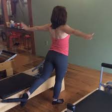 Standing Balance Work While Pulling The Carriage Teaches You A Lot About How To Use Your Core To Support Pilates Workout Pilates Barre Workout Pilates Reformer
