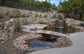Building a pond retaining wall takes about 5 steps, most of which repeat themselves until you are satisfied. Water Feature Design Construction Accent Landscapes