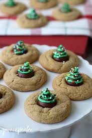 My mom made them for every christmas eve growing up and passed the tradition along to me and my little sister. Christmas Tree Peanut Butter Blossoms Javacupcake
