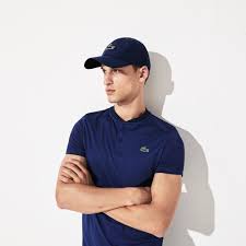This model will effectively protect you from the sun thanks to the curved beak. Lacoste Sport Novak Djokovic On Court Collection Microfiber Cap Lacoste