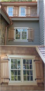 Natural Cedar Wood Shutters With Black Metal Hardware Looks Great With The Copper Colored Gutter Syst Wooden Shutters Shutters Exterior Wood Shutters Exterior