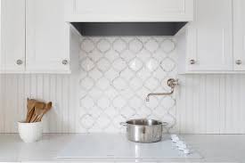 In today's kitchen, a beadboard backsplash has a more timely effect on the look of the kitchen than tile or other materials. White Beadboard Kitchen Backsplash Cottage Kitchen