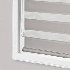 Cord tensioners are attached to all continuous cord loop lift systems. Layered Shades Zebra Shades Acadia Shutters
