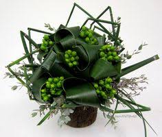 I'd been hopefully watching the developing storefront, wondering what was moving in. 42 Aspidistra Floral Design Inspiration Ideas Floral Design Floral Floral Arrangements