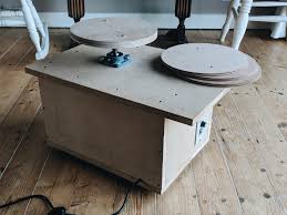 She saw a toy pottery wheel at a local craft shop and had to have one. Homemade Pottery Wheel Progress Photo Pottery