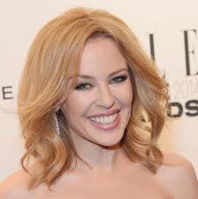 A pretty iconic look, don't you think? Kylie's Morrissey Edmiston  mini-dress for the Australian premiere of 'The Delinquents'.