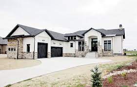 Check spelling or type a new query. Modern Rustic White Farmhouse Black Doors Black Trim Stone Board And Baton And Siding Black Met Farmhouse Style Exterior Farmhouse Exterior House Exterior