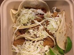 The addition of guacamole with some jack and cheddar cheese shreds is certainly indulgent, but helps. Two Fish Taco Especial W Extra Cilantro Picture Of Rubio S Las Vegas Tripadvisor